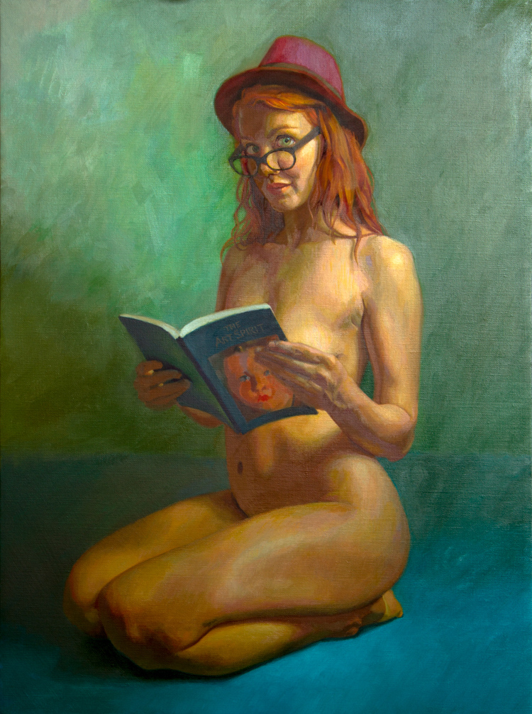 Un livre, des lunettes et un chapeau